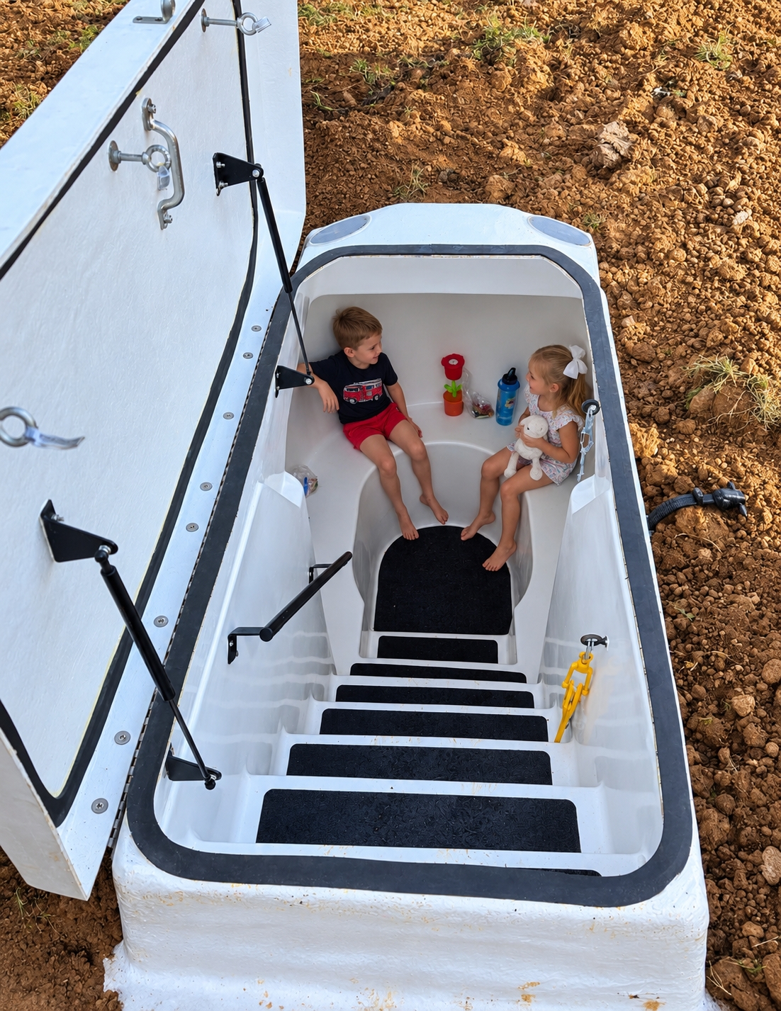 Two young children prepared for the storm.